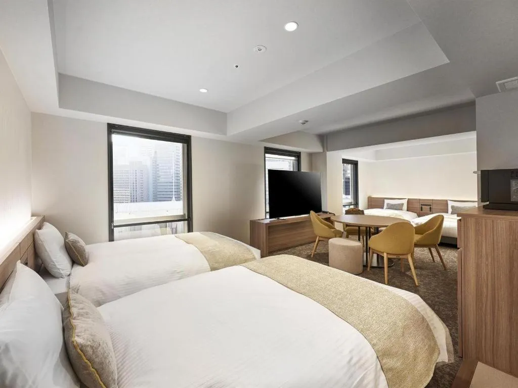 Bed in Daiwa Roynet Hotel OSAKA-SHIN UMEDA ANNEX