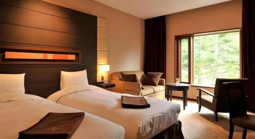 Bed in Akakura Kanko Hotel