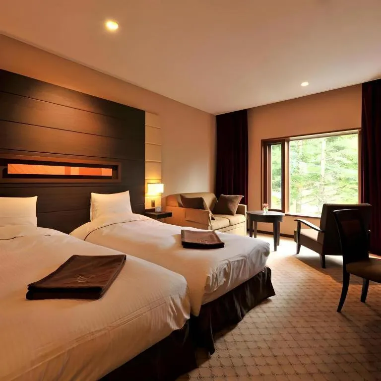 Bed in Akakura Kanko Hotel