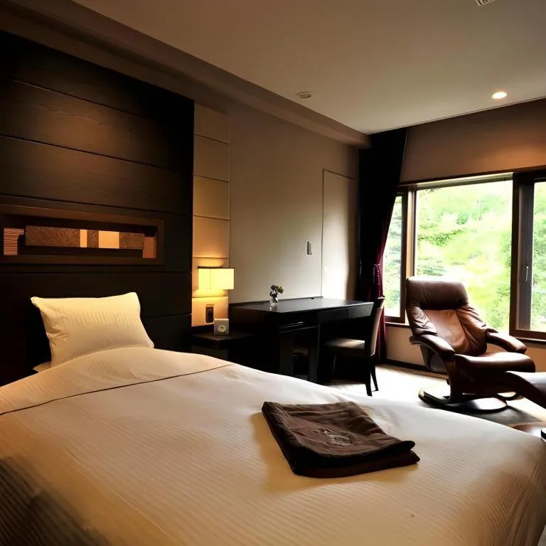 Bed in Akakura Kanko Hotel