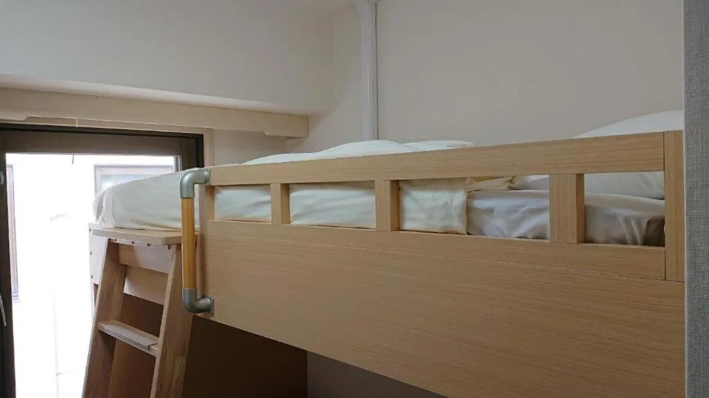 Bed in Hotel Sunshine Iwaki