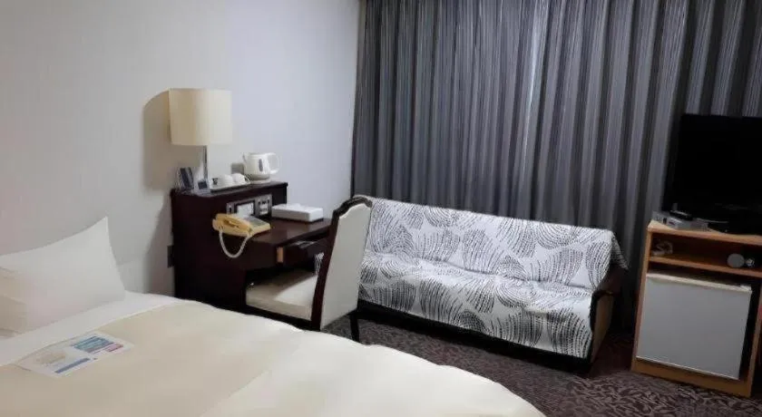 Bed in Hotel Sunshine Iwaki