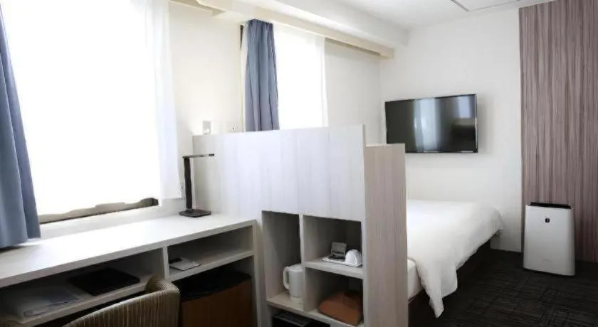 Bed in Hotel Sunshine Iwaki