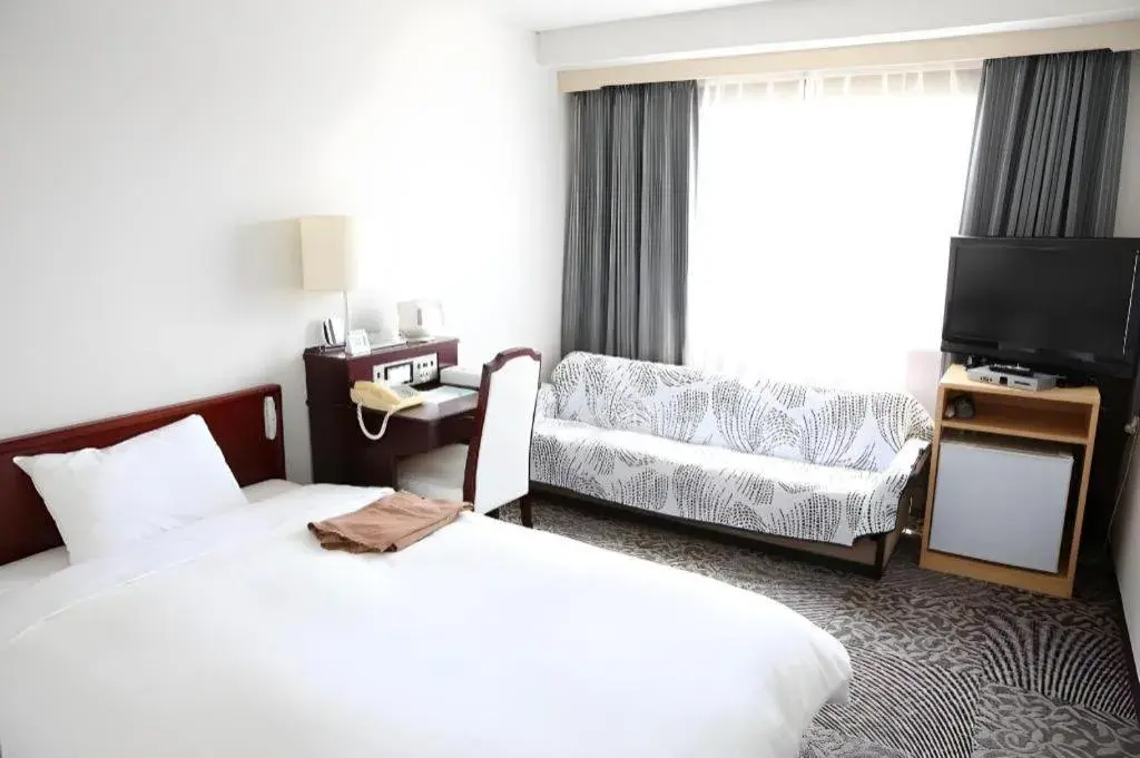 Bed in Hotel Sunshine Iwaki Bed in Hotel Sunshine Iwaki