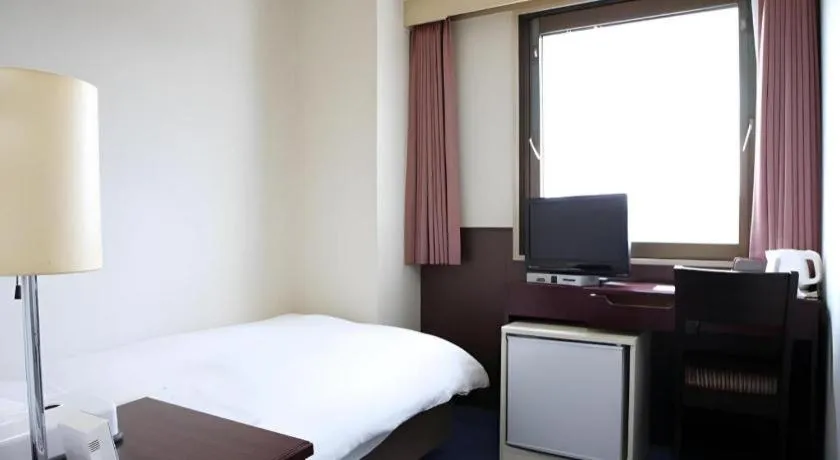 Bed in Hotel Sunshine Iwaki