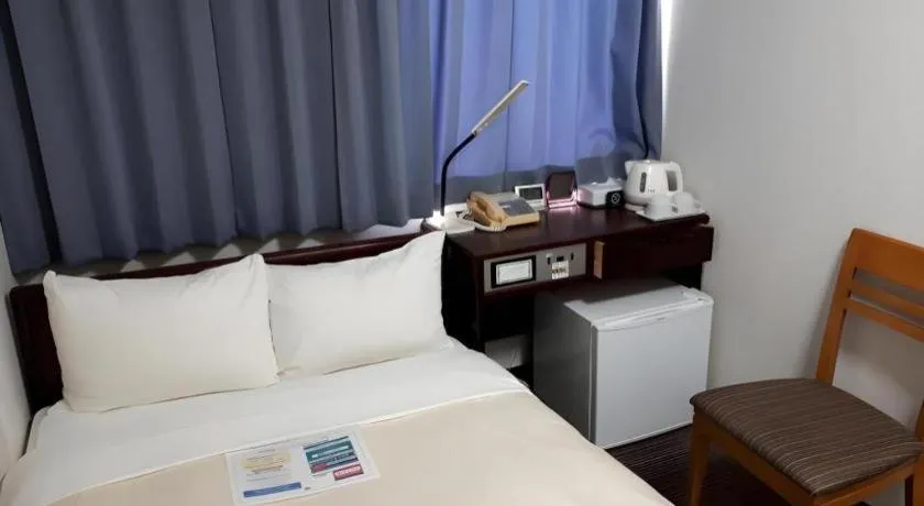 Bed in Hotel Sunshine Iwaki