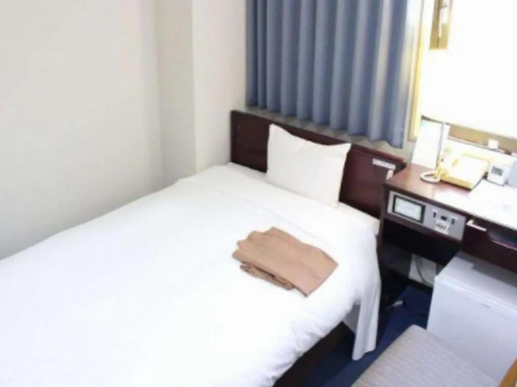 Bed in Hotel Sunshine Iwaki