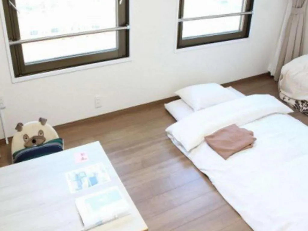 Bed in Hotel Sunshine Iwaki