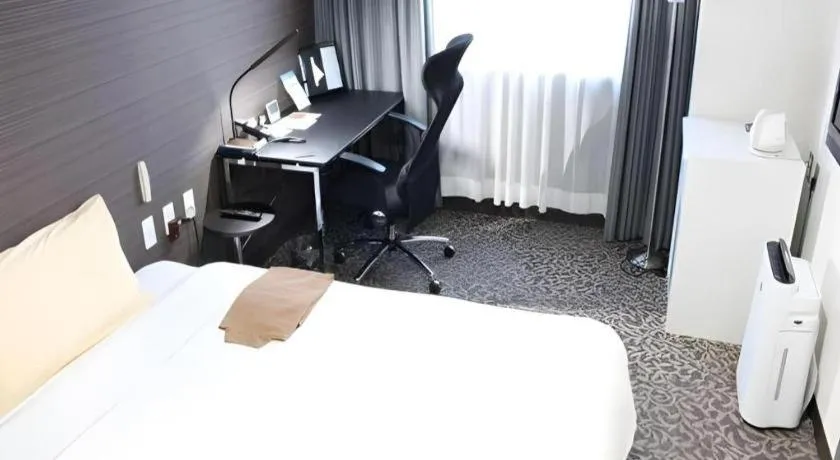 Bed in Hotel Sunshine Iwaki