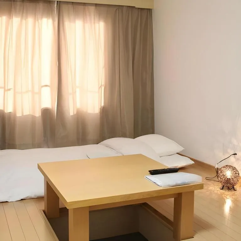 Bed in Hotel Sunshine Iwaki