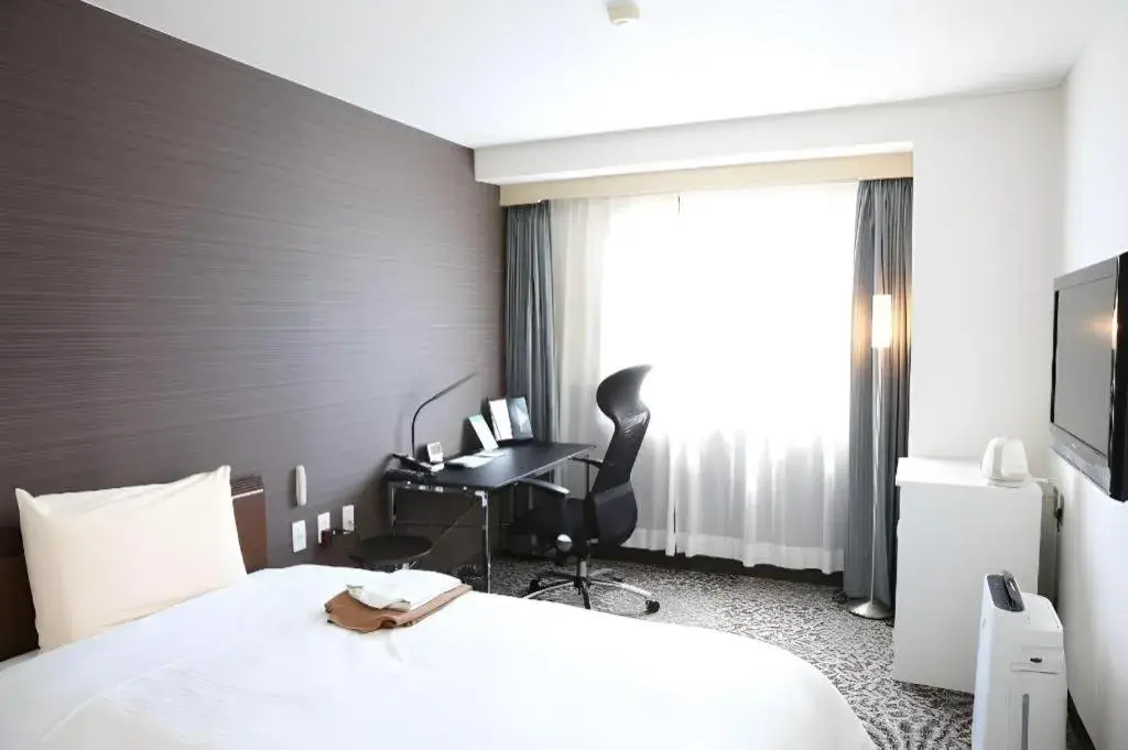 Bed in Hotel Sunshine Iwaki Bed in Hotel Sunshine Iwaki