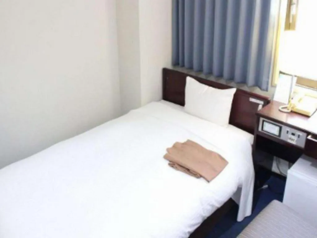 Bed in Hotel Sunshine Iwaki