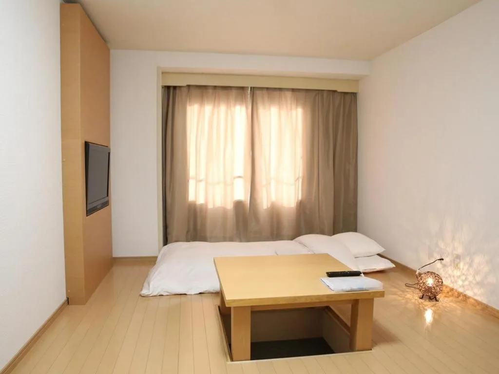 Bed in Hotel Sunshine Iwaki