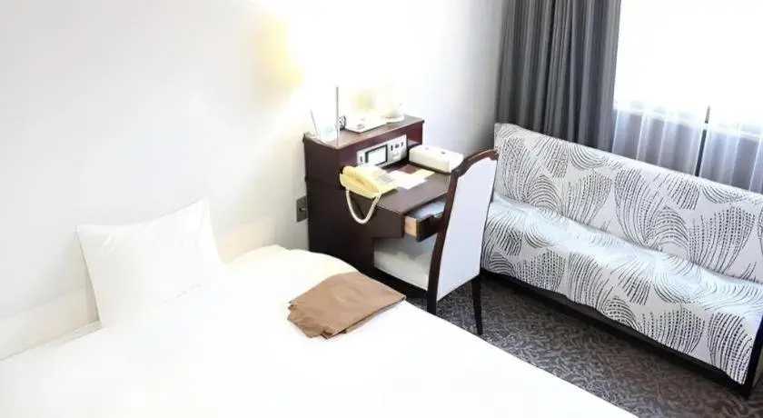 Bed in Hotel Sunshine Iwaki Bed in Hotel Sunshine Iwaki