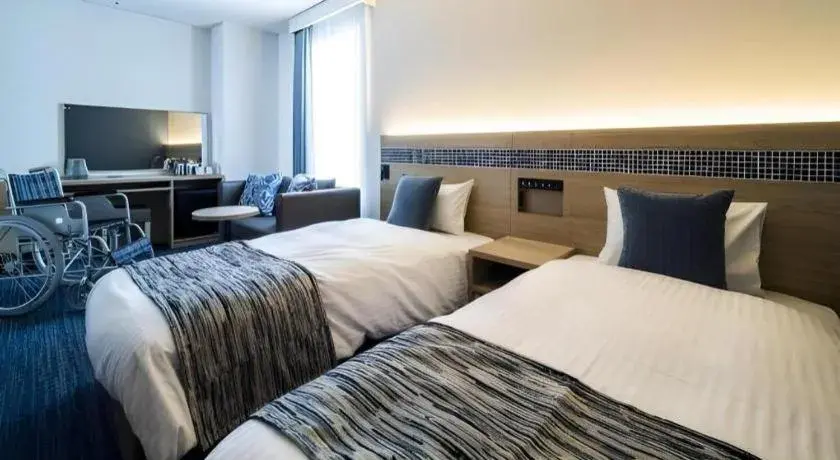 Bed in Goto Tsubaki Hotel Bed in Goto Tsubaki Hotel