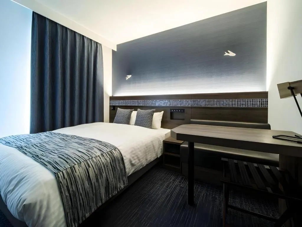 Bed in Goto Tsubaki Hotel