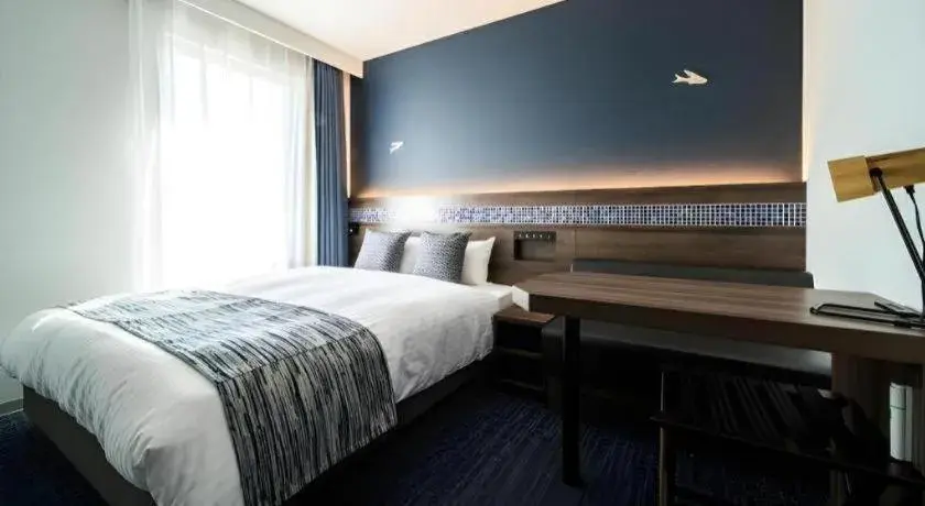 Bed in Goto Tsubaki Hotel Bed in Goto Tsubaki Hotel