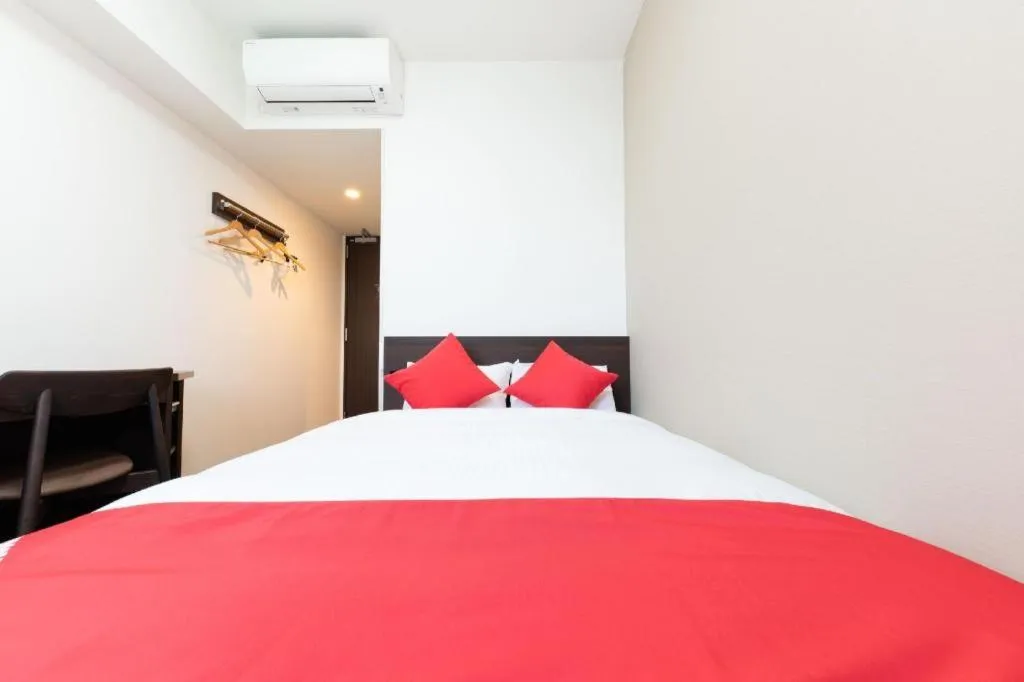 Bed in E Hotel Kumagaya Annex