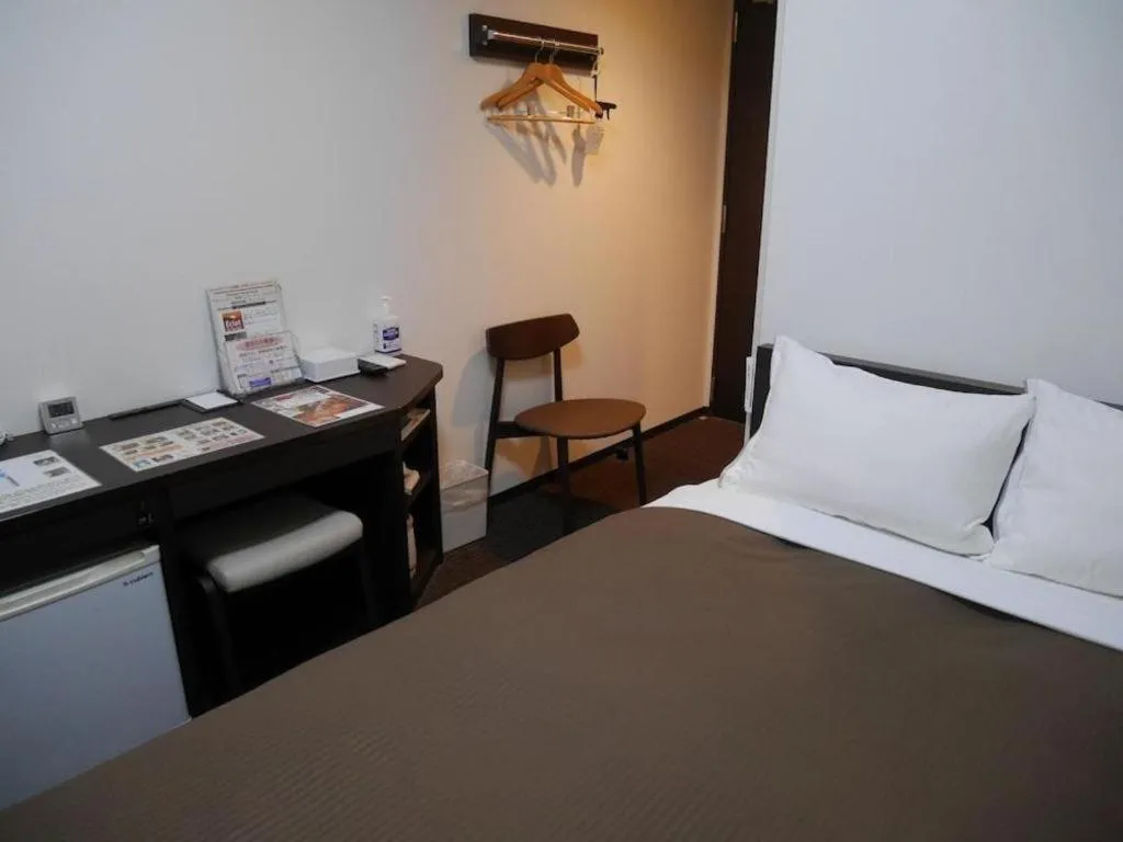 Bed in E Hotel Kumagaya Annex