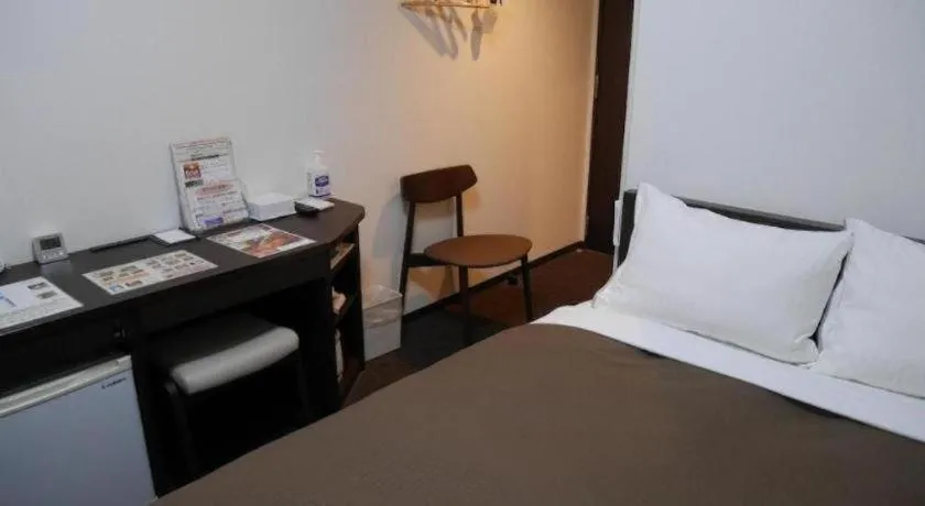 Bed in E Hotel Kumagaya Annex