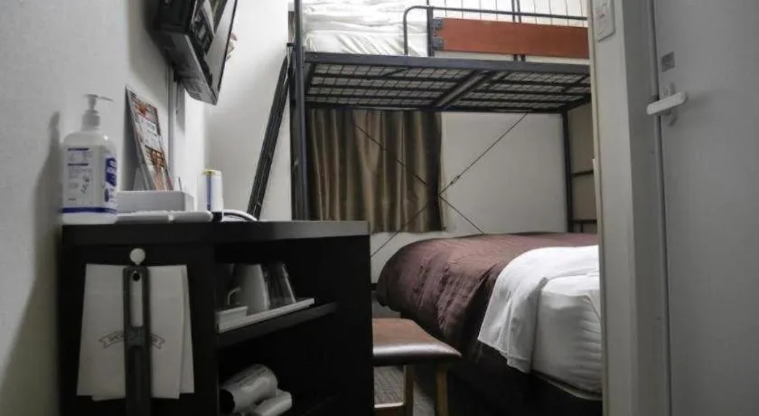 Bed in E Hotel Kumagaya Annex