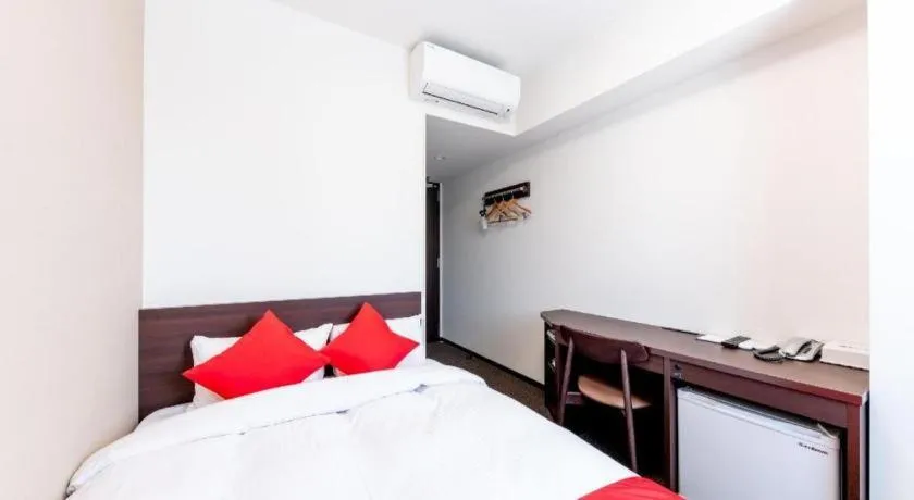 Bed in E Hotel Kumagaya Annex