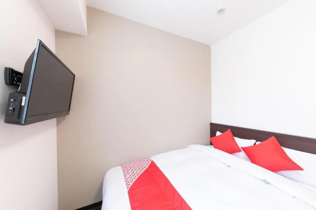 Bed in E Hotel Kumagaya Annex