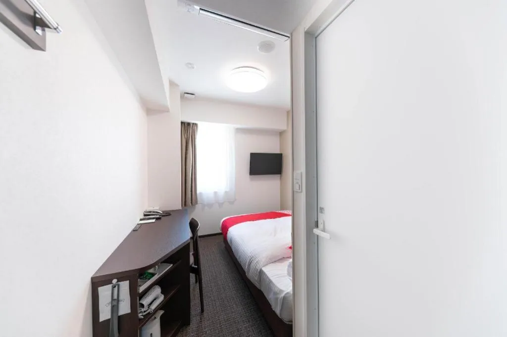 Bed in E Hotel Kumagaya Annex