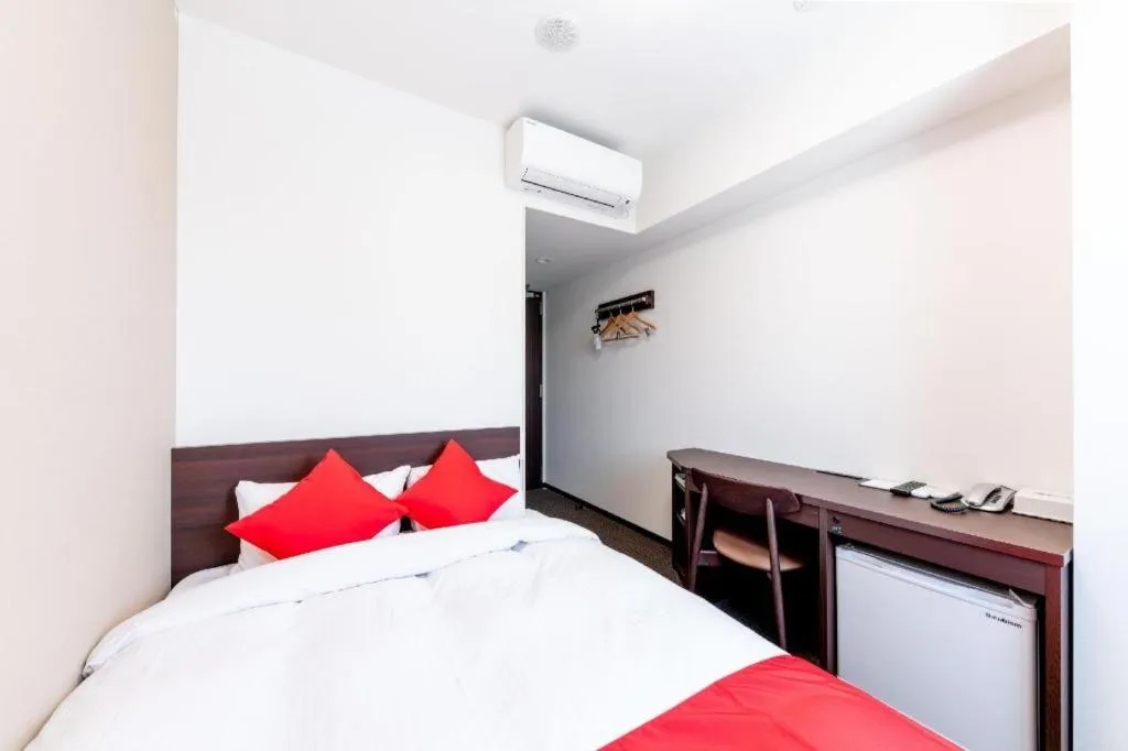 Bed in E Hotel Kumagaya Annex