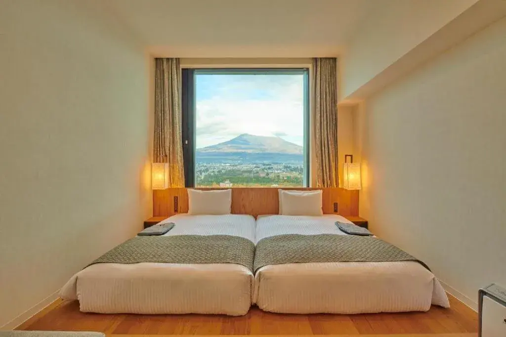 Bed in HOTEL CLAD Bed in HOTEL CLAD