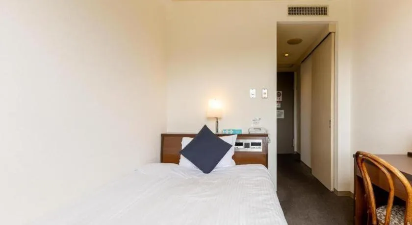 Bed in Tabist Yabuki Station Hotel