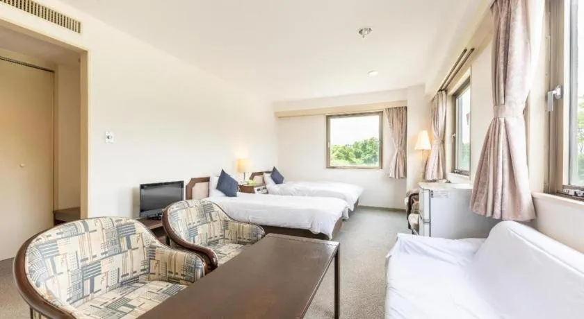 Bed in Tabist Yabuki Station Hotel