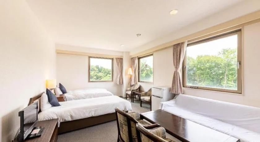 Bed in Tabist Yabuki Station Hotel