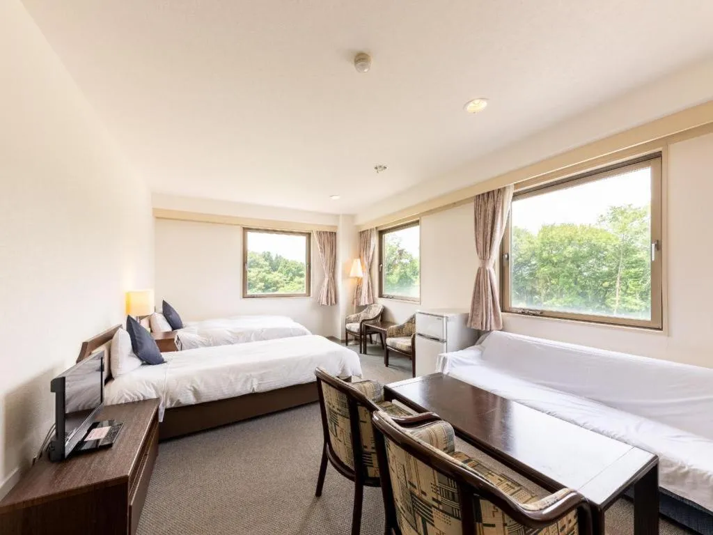 Bed in Tabist Yabuki Station Hotel