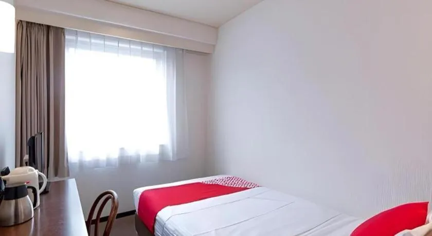 Bed in Tabist Yabuki Station Hotel