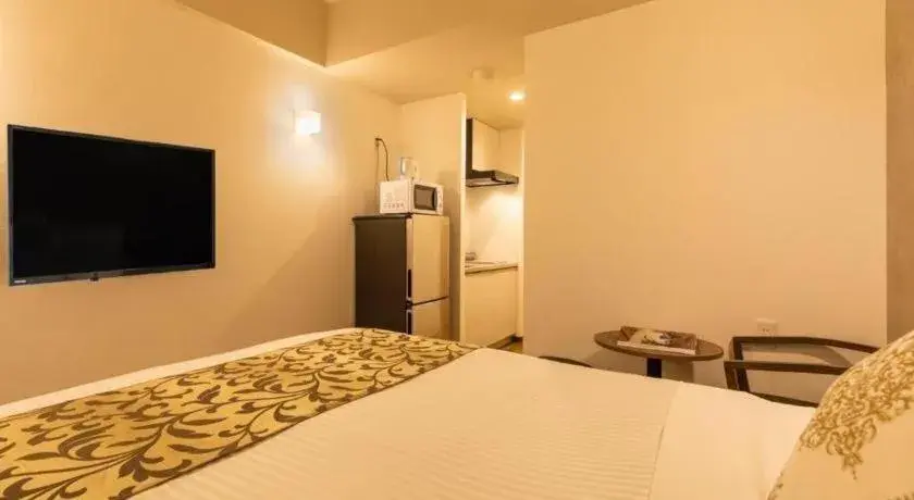 Bed in Mr.KINJO in NAHA Bed in Mr.KINJO in NAHA