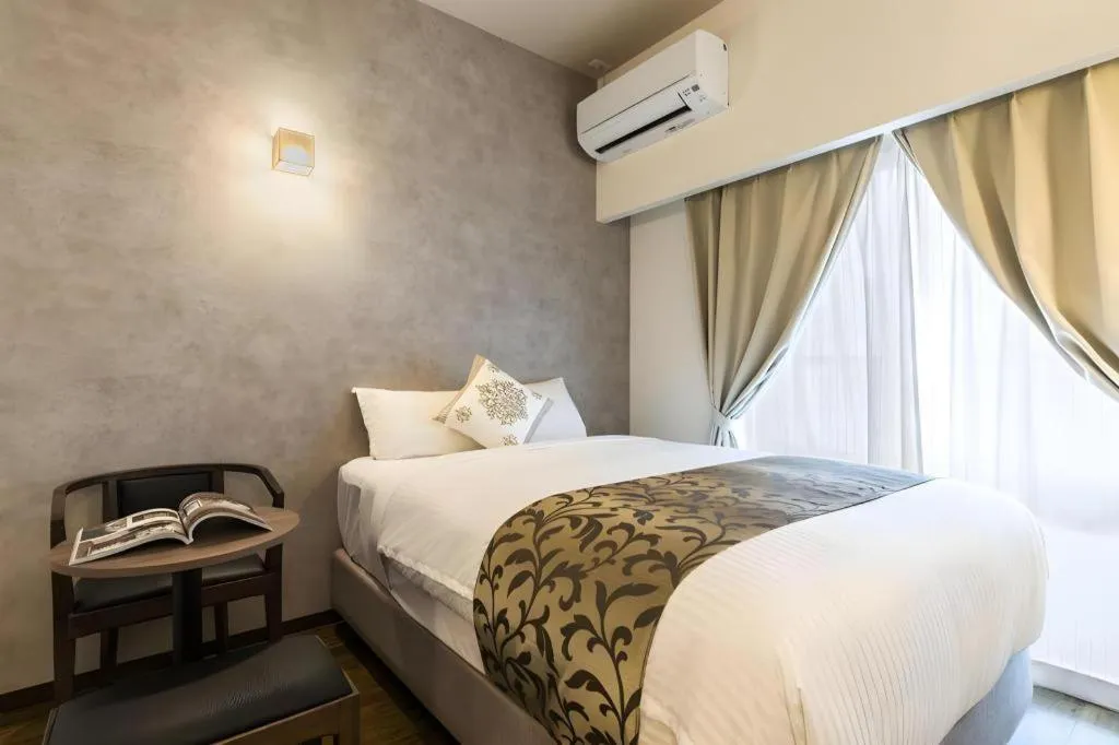 Bed in Mr.KINJO in NAHA