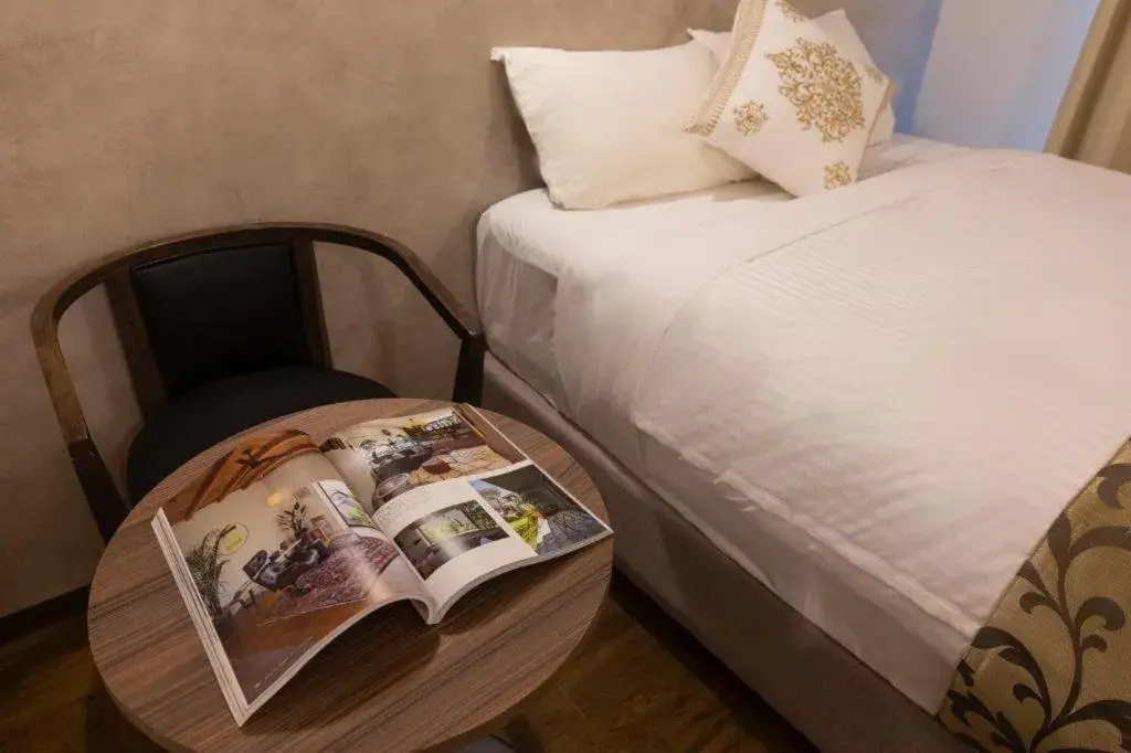 Bed in Mr.KINJO in NAHA Bed in Mr.KINJO in NAHA