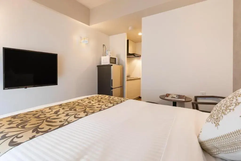 Bed in Mr.KINJO in NAHA Bed in Mr.KINJO in NAHA