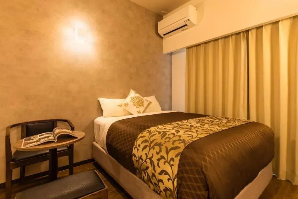 Bed in Mr.KINJO in NAHA Bed in Mr.KINJO in NAHA