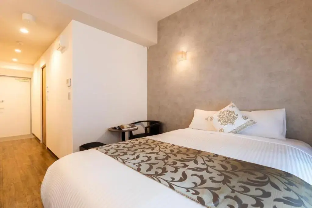 Bed in Mr.KINJO in NAHA Bed in Mr.KINJO in NAHA