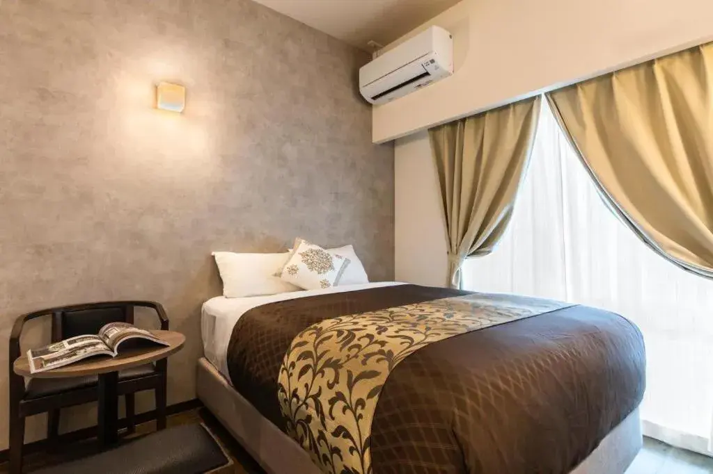 Bed in Mr.KINJO in NAHA Bed in Mr.KINJO in NAHA