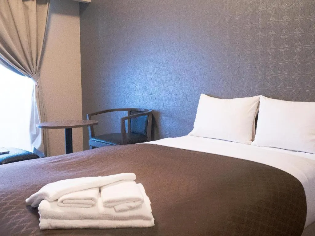 Bed in Mr.KINJO LINK in KUME NAHA