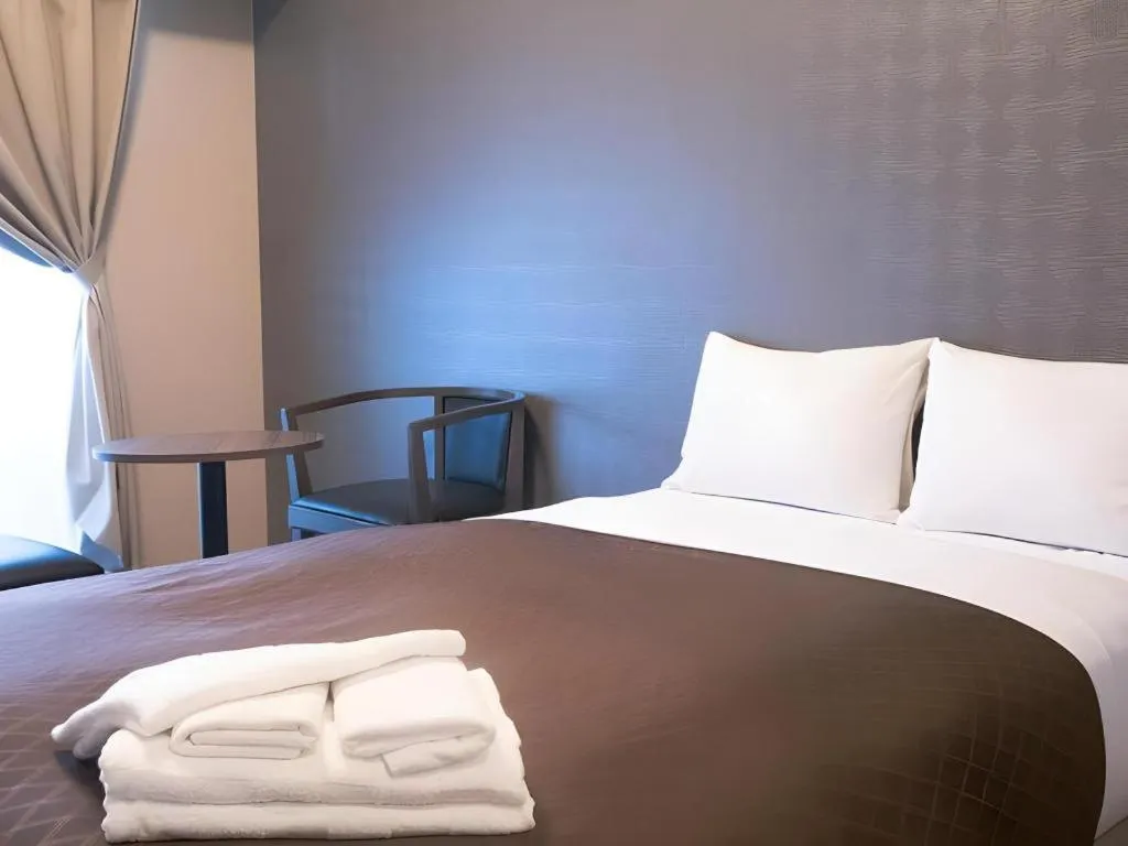 Bed in Mr.KINJO LINK in KUME NAHA