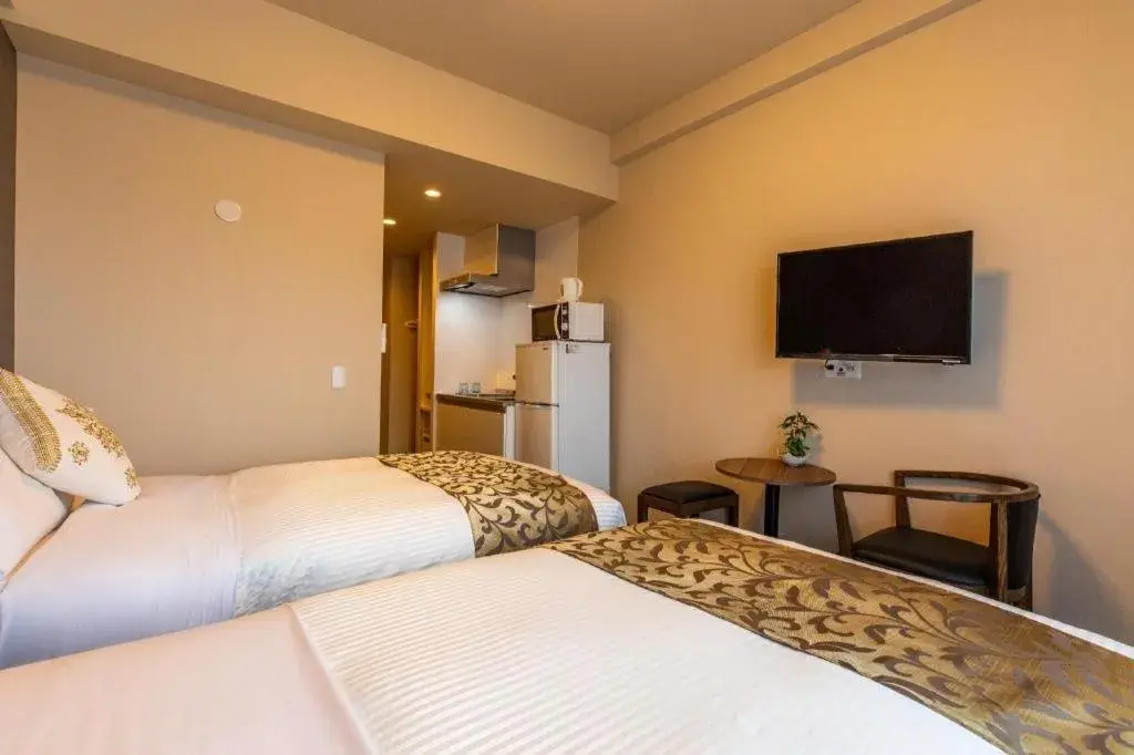 Bed in Mr.KINJO LINK in KUME NAHA Bed in Mr.KINJO LINK in KUME NAHA