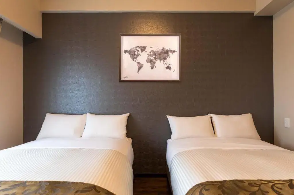 Bed in Mr.KINJO LINK in KUME NAHA Bed in Mr.KINJO LINK in KUME NAHA