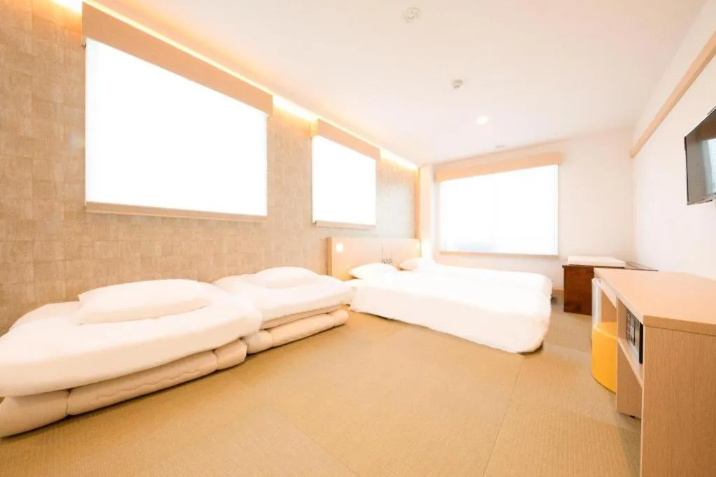 Bed in NAMBA EBISU HOTEL