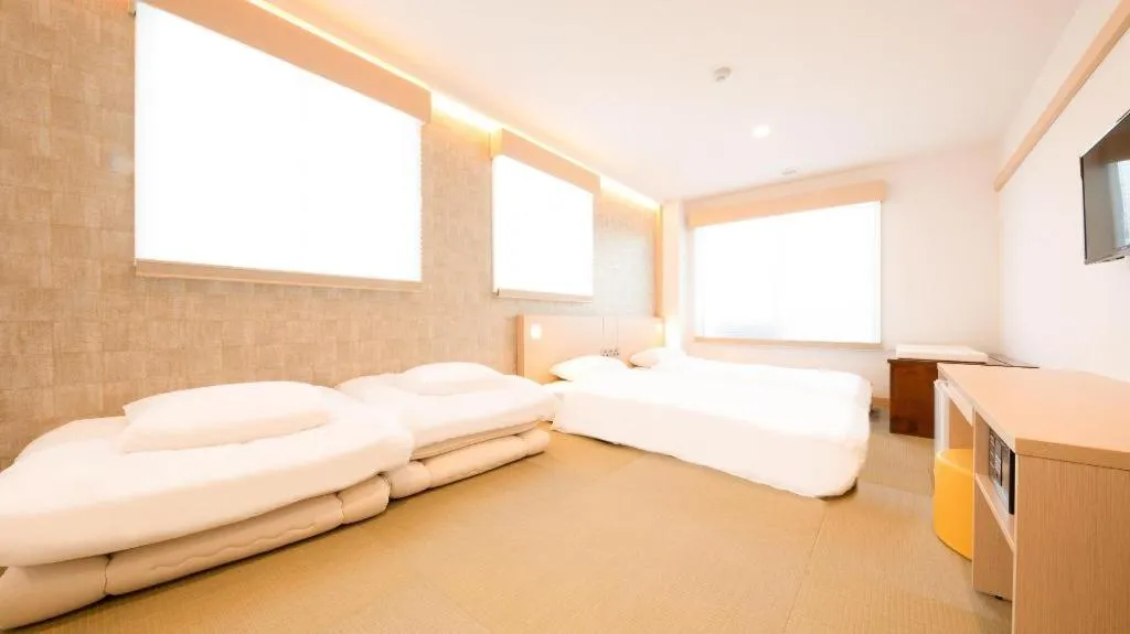 Bed in NAMBA EBISU HOTEL