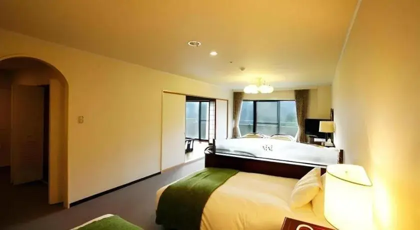 Bed in Atami Mori no Onsen Hotel Bed in Atami Mori no Onsen Hotel