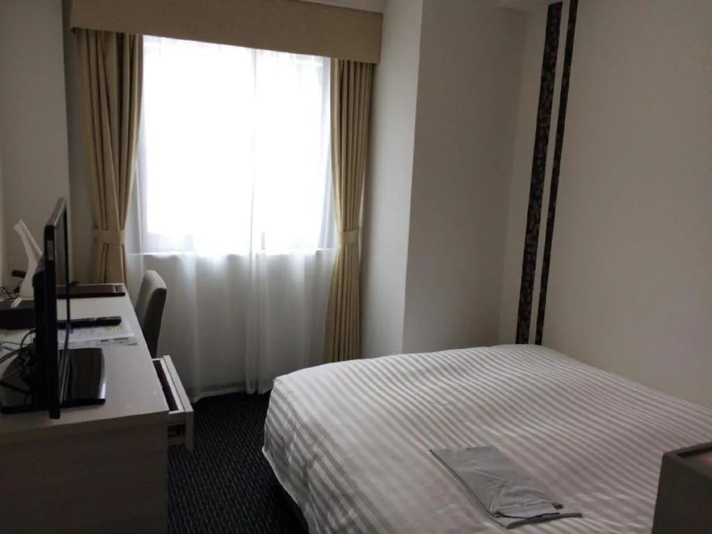 Bed in JR-EAST HOTEL METS NAGAOKA